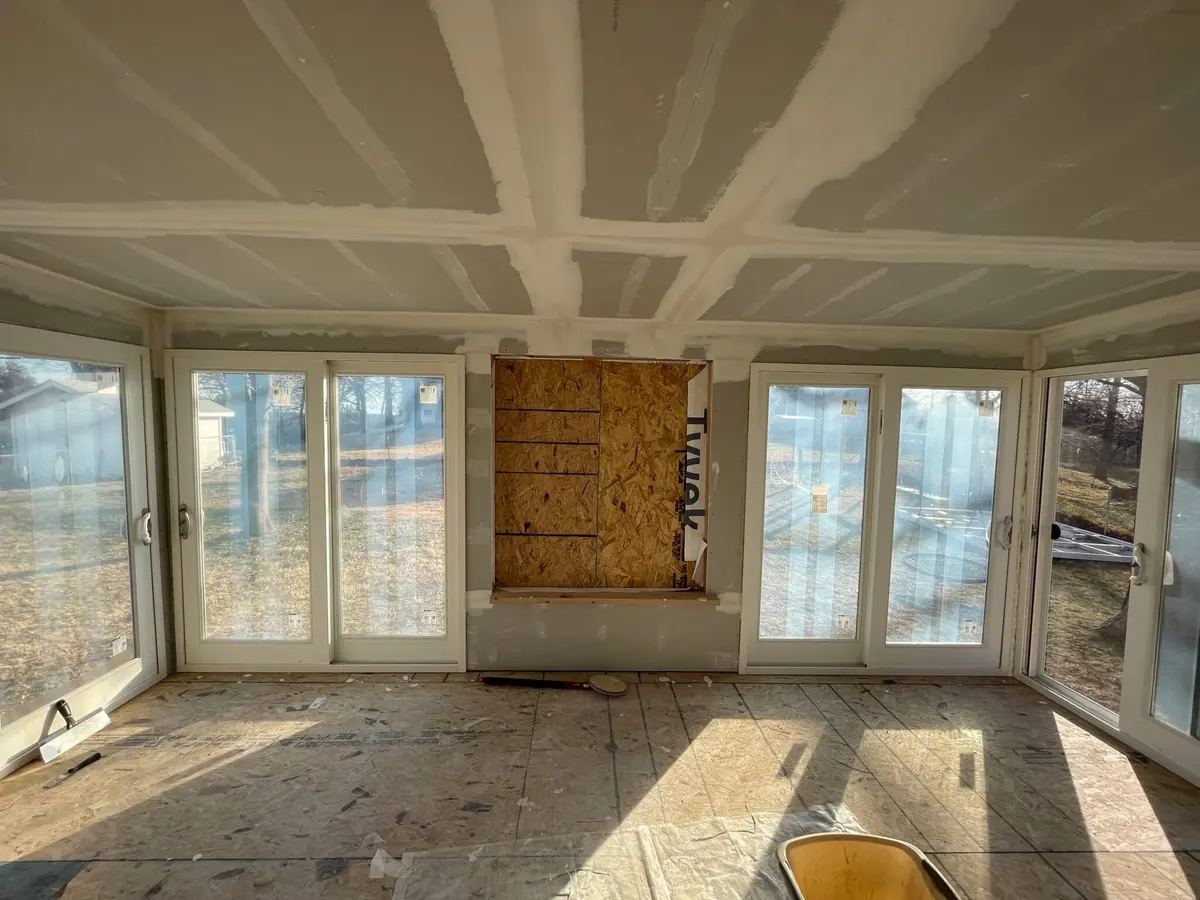 sunroom DIY pic - mudding drywall
